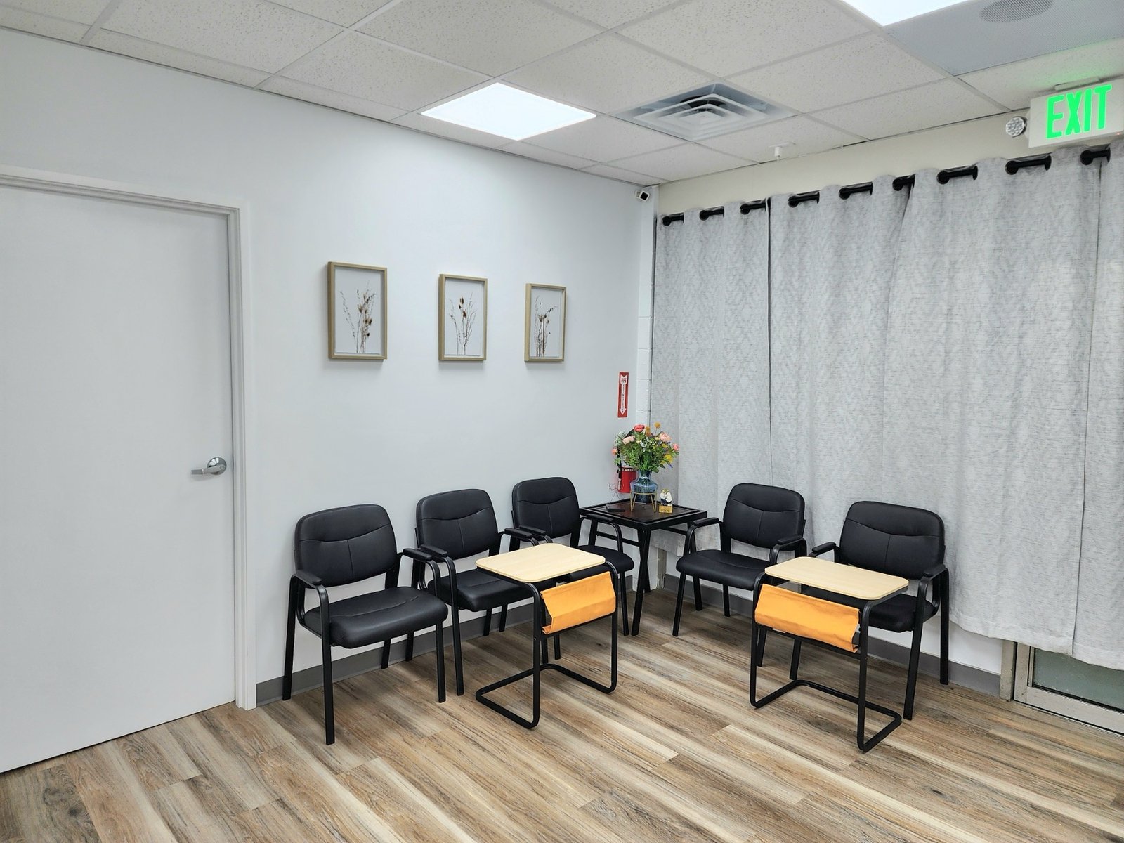Bright patient waiting room at the Radiant Optometry eye care office in Bellflower, CA